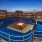 fire pit outside with couches around it