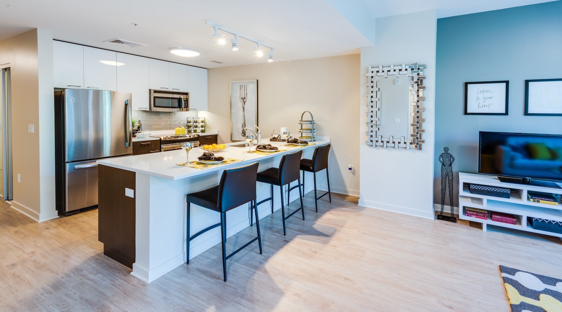 kitchen with an island and bar stools